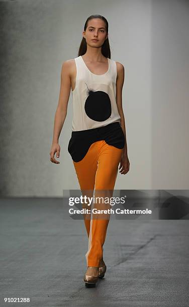 Model walks the runway during the Josh Goot fashion show during London Fashion Week Spring/Summer 2010 on September 21, 2009 in London, England.