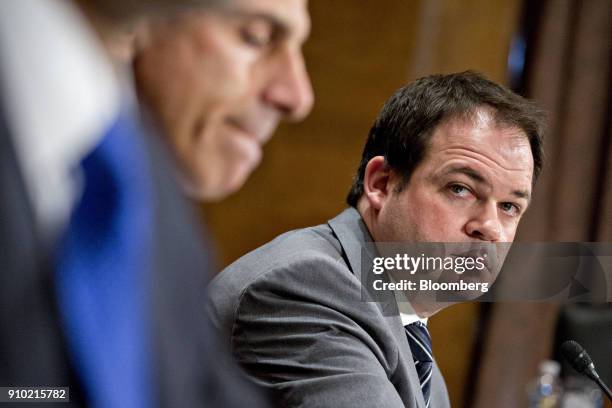 Eric Chewning, deputy assistant secretary of defense for manufacturing and industrial base policy , listens during a Senate Banking, Housing and...