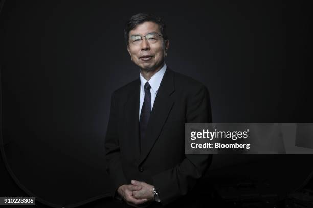 Takehiko Nakao, president of the Asian Development Bank , poses for a photograph following a Bloomberg Television interview on day three of the World...