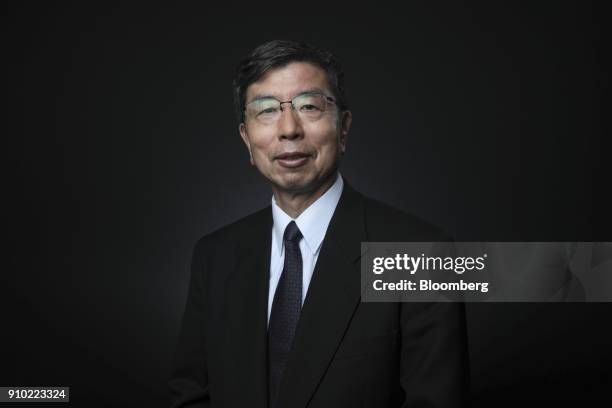 Takehiko Nakao, president of the Asian Development Bank , poses for a photograph following a Bloomberg Television interview on day three of the World...