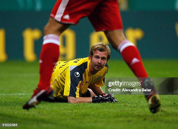 Goalkeeper Soeren Pirson of Oberhausen reacts after he missed to save a ball during the DFB Cup second round match between FC Bayern Muenchen and...