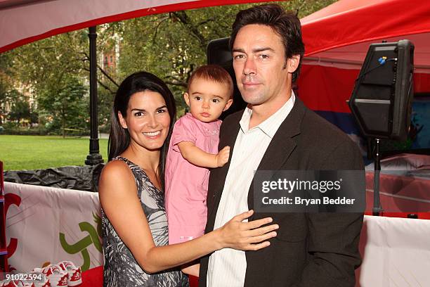 Actress Angie Harmon, her daughter Emery Hope Sehorn and husband Jason Sehorn attend Huggies Little Movers Adventure Zone And Live Auction at Madison...