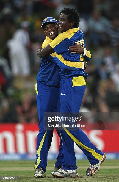 Ajantha Mendis of Sri Lanka celebrates with team mate Thilan Samaraweera after taking the wicket of Jacques Kallis of South Africa during the ICC...