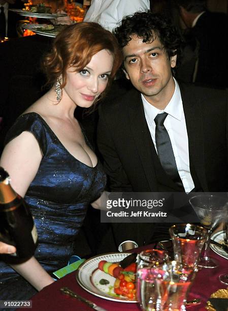 Actors Christina Hendricks and Geoffrey Arend attend the Governors Ball for the 61st Primetime Emmy Awards held at the Los Angeles Convention Center...