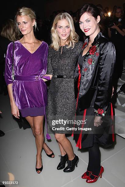 Jaquetta Wheeler, Donna Air and Jasmine Guiness watch from the front row at the Burberry Prorsum Spring/Summer 2010 Show at Rootstein Hopkins Parade...