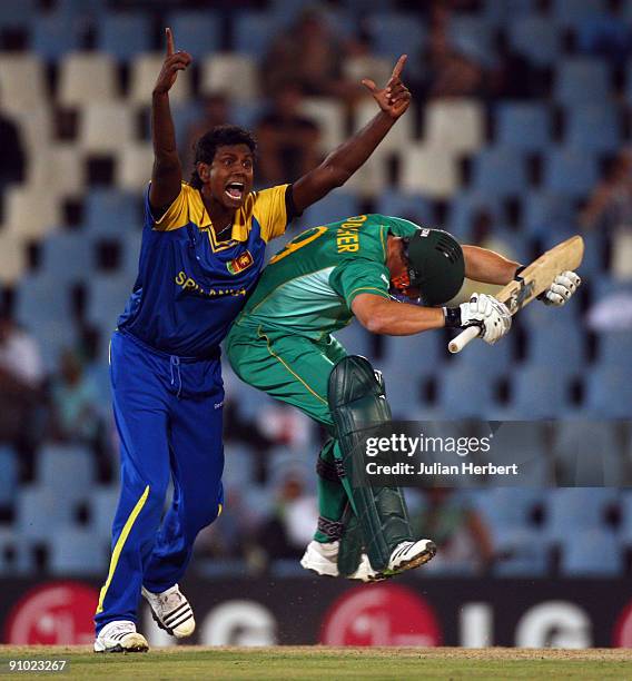 Mark Boucher of South Africa collides with the successfully appealing Angelo Matthews of Sri Lanka during The ICC Champions Trophy Group B match...