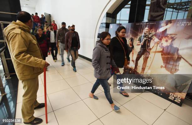 People coming out of the cinema hall after watching Padmaavat at Centre stage mall, on January 25, 2018 in Noida, India. According to the film's...