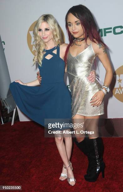 Piper Perri and Holly Hendrix arrive for the 2018 XBIZ Awards held at J.W. Marriot at L.A. Live on January 18, 2018 in Los Angeles, California.