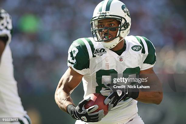 Chansi Stuckey of the New York Jets rushes against the New England Patriots at Giants Stadium on September 20, 2009 in East Rutherford, New Jersey.