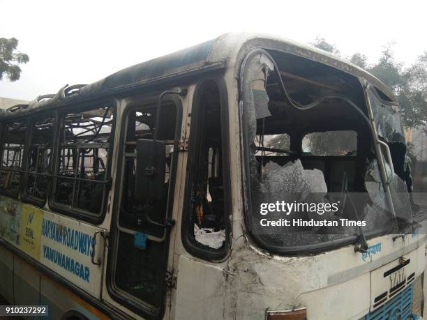 Haryana roadways bus was torched by unknown elements at the Bus stand on January 25, 2018 in Hisar, India. Rajput groups hold a demonstration in many...