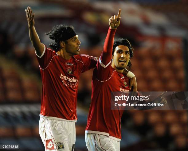 Hugo Colace of Barnsley celebrates scoring the third goal for his team with teammate Anderson De Silva during the Carling Cup Third Round game...