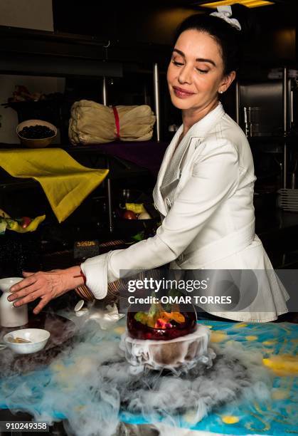 Chef Martha Ortiz prepares Vampire ceviche, made with sangrita , mango, cured fish, purple onion and coriander, and decorated with pineapple...