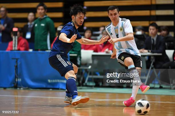 Maximiliano Rescia of Argentina and Manabu Takita of Japan compete for the ball during the Futsal international friendly match between Japan and...