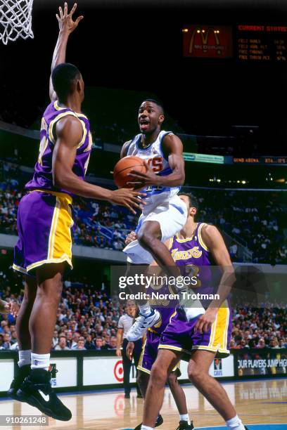 Terrell Brandon of the Cleveland Cavaliers drives during a game played on November 30, 1994 at Gund Arena in Cleveland, Ohio. NOTE TO USER: User...