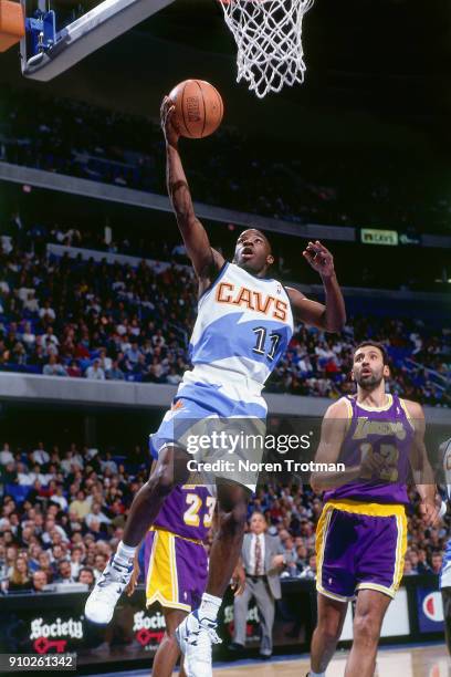 Terrell Brandon of the Cleveland Cavaliers shoots during a game played on November 30, 1994 at Gund Arena in Cleveland, Ohio. NOTE TO USER: User...