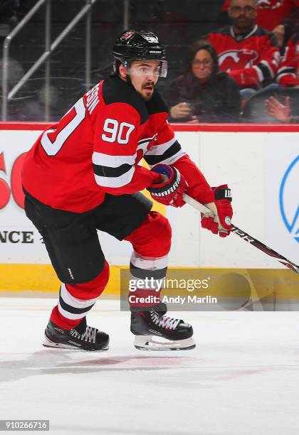 Marcus Johansson of the New Jersey Devils skates during the game against the Detroit Red Wings at Prudential Center on January 22, 2018 in Newark,...