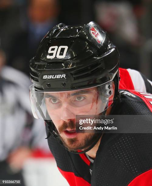 Marcus Johansson of the New Jersey Devils looks on during the game against the Detroit Red Wings at Prudential Center on January 22, 2018 in Newark,...