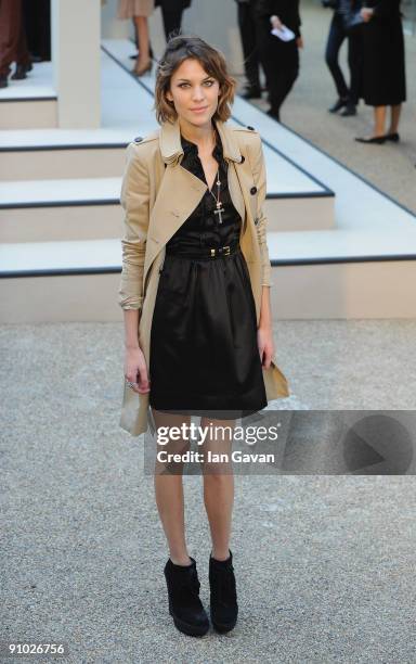 Alexa Chung arrives at the Burberry Prorsum fashion show at Rootstein Hopkins Parade Ground during London Fashion Week on September 22, 2009 in...
