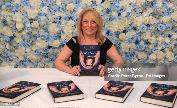 Denise Fergus, the mother of murdered toddler James Bulger, with her book 'I Let Him Go' during its launch in The Suites Hotel in Knowsley,...