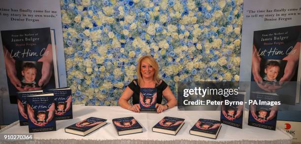 Denise Fergus, the mother of murdered toddler James Bulger, with her book 'I Let Him Go' during its launch in The Suites Hotel in Knowsley,...