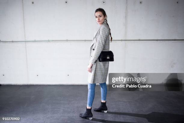 Rebeca Traspaderne wears Zara shoes, Stradivarious trousers and handbag and Zara coat and handbag at Ifema during Mercedes Benz Fashion Week Madrid...