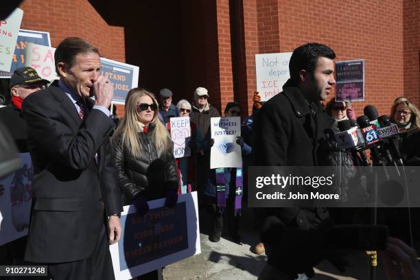 Sen. Richard Blumenthal listens as Guatemalan immigrant Joel Colindres speaks to supporters ahead of his ICE check-in on January 25, 2018 in...