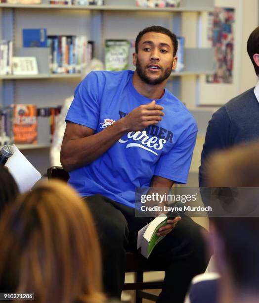 Josh Huestis of the Oklahoma City Thunder visits with the junior class from John Marshall High School as a part of the Thunder High School Book Club...