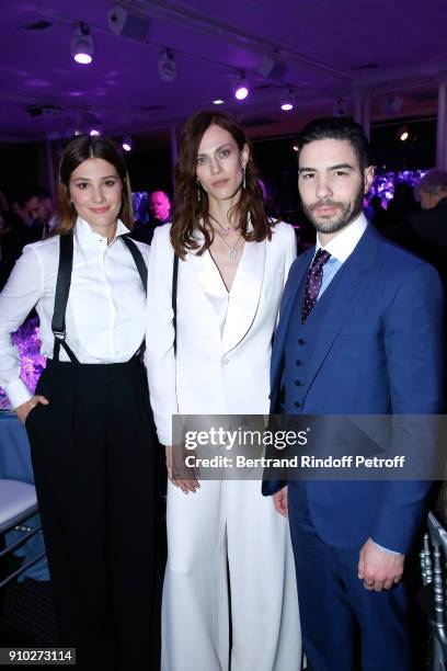 Alice Pol, Aymeline Valade and Tahar Rahim, all dressed in Ralph Lauren, attend the 16th Sidaction as part of Paris Fashion Week on January 25, 2018...