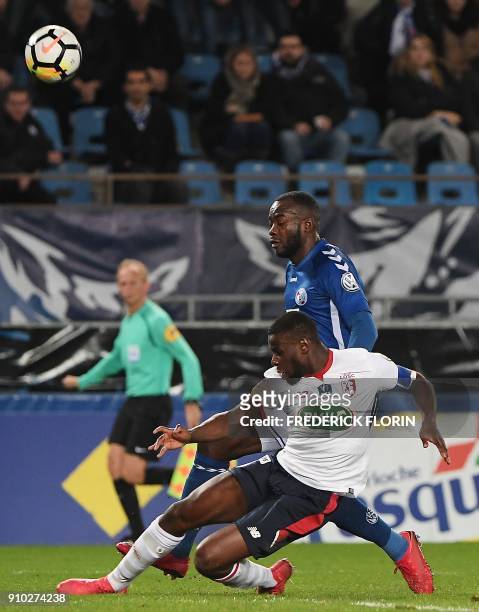 Strasbourg's French forward Stephane Bahoken vies with Lille's Cameroon midfielder Ibrahim Amadou during the French Cup football match between...