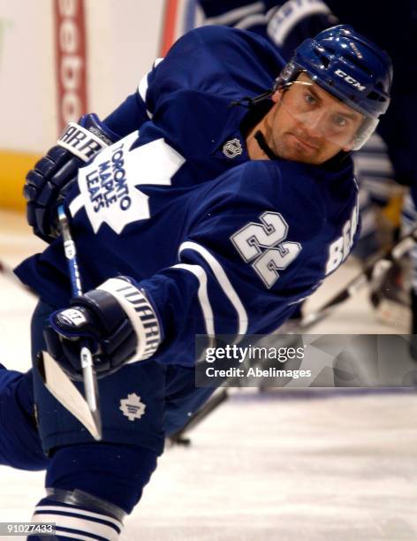 Francois Beauchemin of the Toronto Maple Leafs shoots during warm-ups before a pre-season NHL game at the Air Canada Centre on September 22, 2009 in...