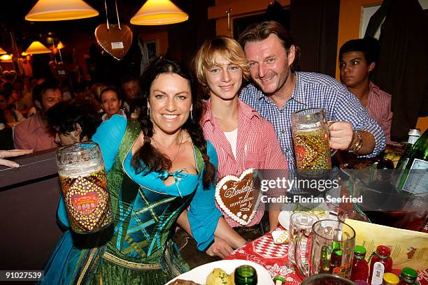 Christine Neubauer and son Lambert Dinzinger and husband Lambert Dinzinger attend the Davidoff wiesn 2009 at Hippodrom at the Theresienwiese on...