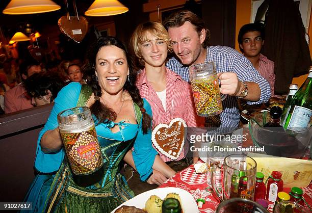 Christine Neubauer and son Lambert Dinzinger and husband Lambert Dinzinger attend the Davidoff wiesn 2009 at Hippodrom at the Theresienwiese on...