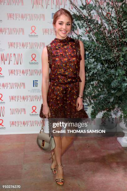 French actress Alice Isaaz poses upon arriving to the Diner de la Mode fundraiser dinner, to benefit the French anti-AIDS association Sidaction, on...