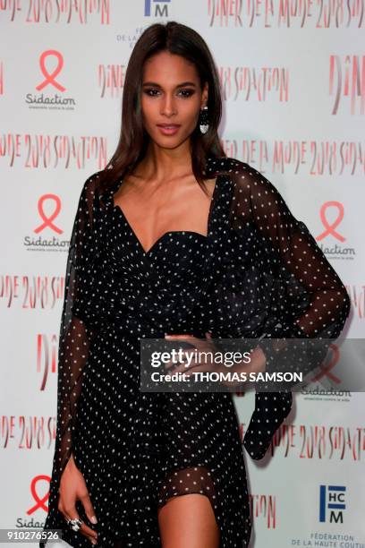 French model Cindy Bruna poses upon arriving to the Diner de la Mode fundraiser dinner, to benefit the French anti-AIDS association Sidaction, on...