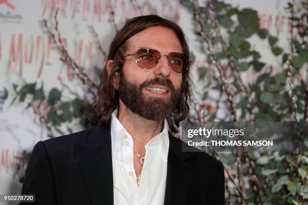 French hair stylist John Nollet poses upon arriving to the Diner de la Mode fundraiser dinner, to benefit the French anti-AIDS association Sidaction,...