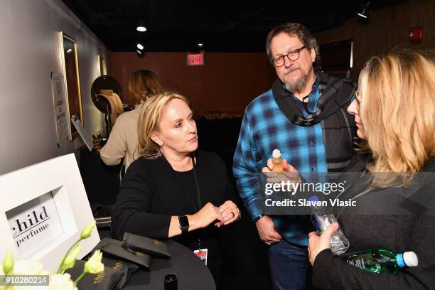 Jerry Douglas with CHILD perfume studio products in the gifting lounge at the 60th Annual GRAMMY Awards MusiCares Person Of The Year at Radio City...