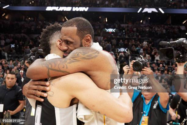 Cleveland Cavaliers LeBron James hugging San Antonio Spurs Danny Green after game at AT&T Center. James becomes the seventh player to score his...