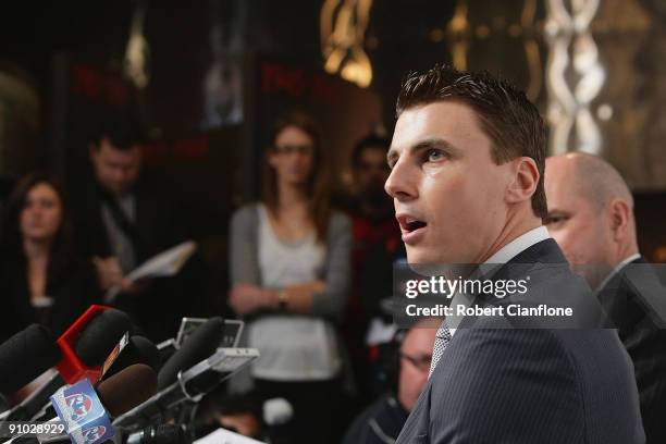 Matthew Lloyd of the Bombers talks to the media as he announces his retirememnt from AFL football at Windy Hill on September 23, 2009 in Melbourne,...