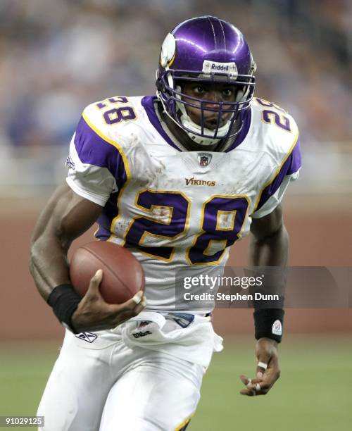 Running back Adrian Peterson of the Minnesota Vikings carries the ball against the Detroit Lions at Ford Field on September 20, 2009 in Detroit,...