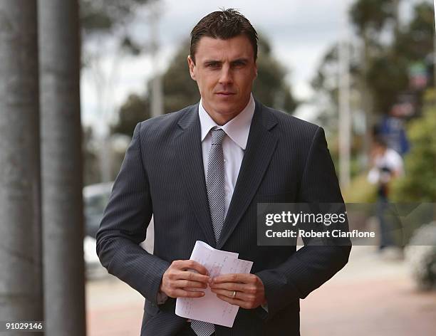 Matthew Lloyd of the Bombers arrives to announce his retirement at Windy Hill on September 23, 2009 in Melbourne, Australia.