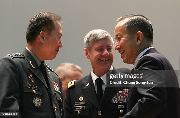 South Korea's new Defence Minister Kim Tae-Young talks with Gen. Walter Sharp , commander of the United Nations Comand , Combined Forces Command ,...