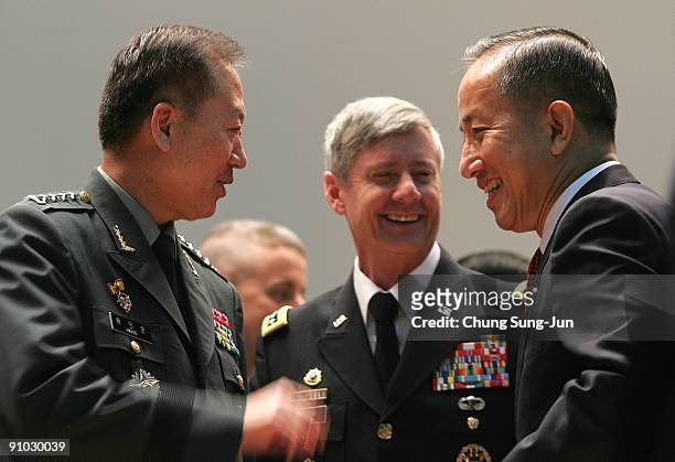 South Korea's new Defence Minister Kim Tae-Young talks with Gen. Walter Sharp , commander of the United Nations Comand , Combined Forces Command ,...