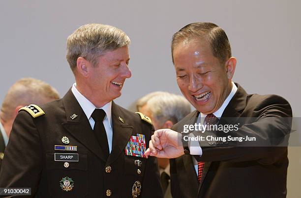 South Korea's new Defence Minister Kim Tae-Young talks with Gen. Walter Sharp , commander of the United Nations Comand , Combined Forces Command ,...