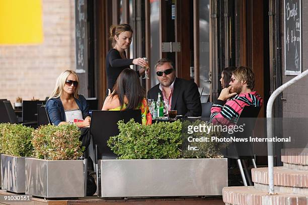 Controversial radio DJ Kyle Sandilands and his co-host Jackie O lunch together on Woolloomoolo Wharf on September 23, 2009 in Sydney, Australia.