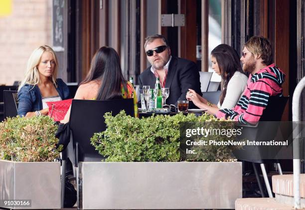 Controversial radio DJ Kyle Sandilands and his co-host Jackie O lunch together on Woolloomoolo Wharf on September 23, 2009 in Sydney, Australia.