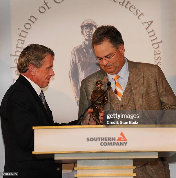 Commissioner Tim Finchem presents the Payne Stewart Award to the 2009 recipient Kenny Perry during THE TOUR Championship presented by Coca-Cola, the...