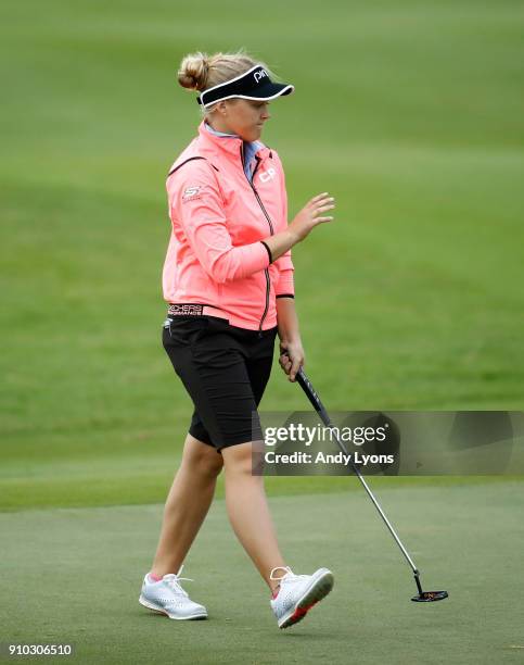 Brooke Henderson of Canada waves to the crowd after making birdie on the 6th hole during the first round of the Pure Silk Bahamas LPGA Classic at the...