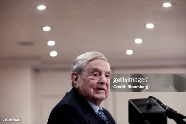 George Soros, billionaire and founder of Soros Fund Management LLC, speaks at an event on day three of the World Economic Forum in Davos,...