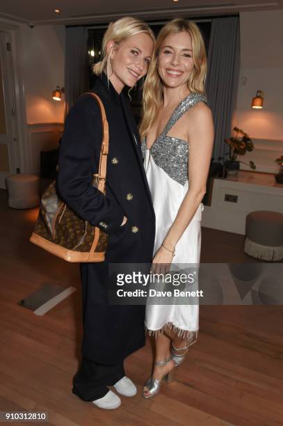 Poppy Delevingne and Sienna Miller attend the launch of Teresa Tarmey's new 'at home facial system' at Mortimer House, sponsored by CIROC, on January...
