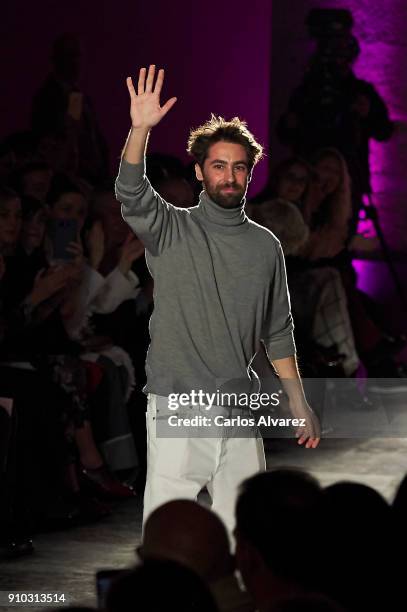 Spanish designer Juan Vidal walks the runway at the end of the Juan Vidal fashion show during the Mercedes Benz Fashion Week Autumn/Winter 2018 at...